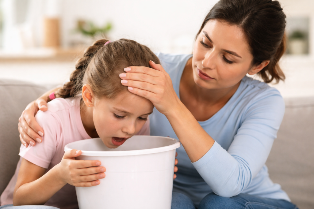 Child Vomiting But No Fever: Causes, Red Flags, and What Parents Should Do child vomiting no fever parent caring